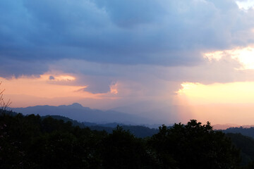 Silhouette and cloud in sunset with the valley mountain view in Chiangmai Province of Thailand