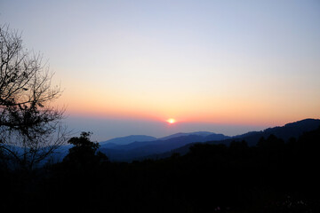Silhouette in sunset with the valley mountain view in Chiangmai Province of Thailand
