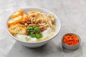 Bubur ayam. Chicken porridge is a typical Indonesian dish made from rice cooked in lots of water