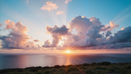 Obraz premium Dramatic sunset over ocean with colorful clouds, nature's tranquility