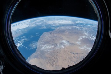 View of Earth from space captured during low-light conditions showcasing urban lights and natural atmosphere