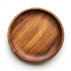 A top view of a round wooden plate with visible wood grain texture