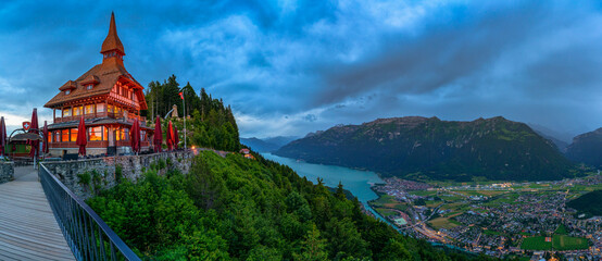 Panorama of Lake Brienz, Interlaken, and the surrounding Swiss Alps from Harder Kulm in...