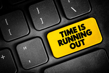 Time is running out text concept button on keyboard