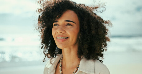 Thinking, smile and woman at sea for holiday, vacation and outdoor travel for adventure. Beach, face and happy female person in nature at ocean for trip, summer and tourism ideas on island in Spain