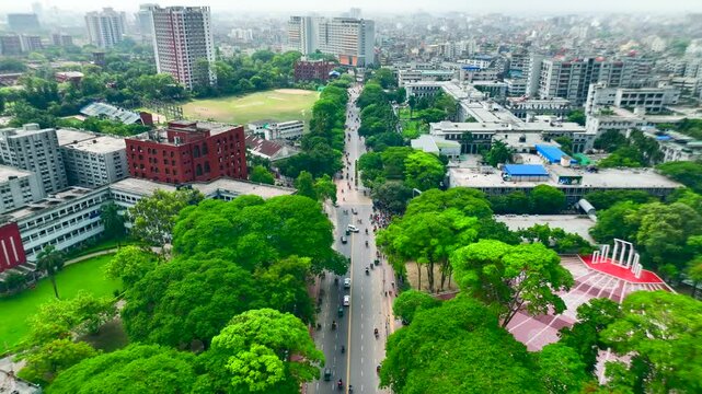 Breathtaking Aerial View of Central Shaheed Minar  Surrounded by Dhaka, Medical college,  Dhaka University Green Trees and Bustling Roads