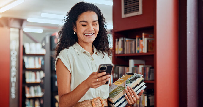 Woman, phone and books with texting at library with smile, contact and excited with studying at college. Girl, person and university student with smartphone, mobile app or social media at academy