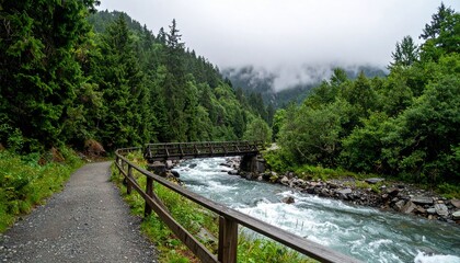 A misty mountain trail with an old wooden bridge over a rushing river, surrounded by lush green trees and fog rolling through the valley.