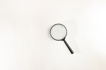 black magnifying glass isolated on white background.