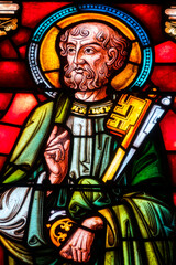 Stained glass (19th century) of Saint Peter the apostle with the keys of the Church.