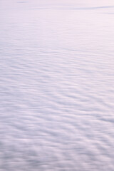 Serene Clouds Gently Covering the Beautiful Sky at Dusk to Create a Tranquil and Peaceful Atmosphere