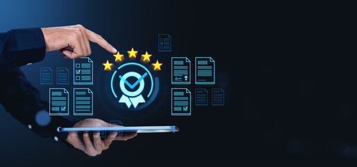 Businessman rating quality management documents with digital icons on dark background.