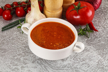 Hot tomato soup with diced chicken