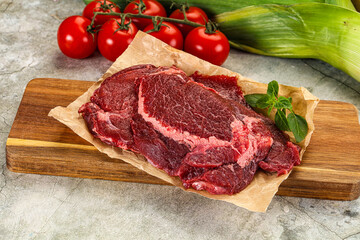 Raw beef cheeks cut for cooking