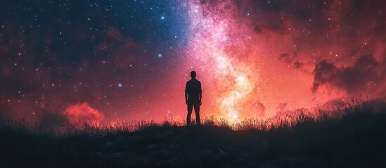 Fototapeta premium Solitary figure gazes at cosmic expanse, hillside at night, use in inspirational or science fiction posters