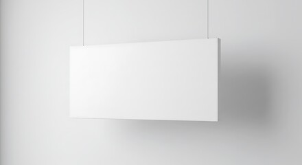 Fototapeta premium Hanging White Banner Against a White Wall for Messaging