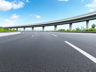 Naklejka premium Asphalt highway curves gently under elevated roadway, cityscape backdrop