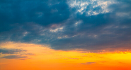 Sky sunset evening sunrise cloud weather dramatic landscape goldent and indigo color gradient pastel horizon, twilight yellow golden reflection morning nature environment energy ecosystem change.