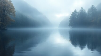 Fototapeta premium Serene Misty Lake Landscape With Trees And Mountains Reflecting On Calm Water