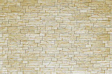Beige stone mosaic wall background