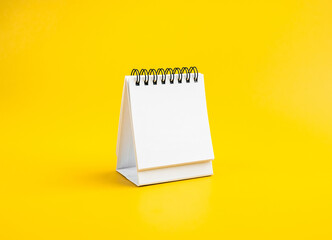 Blank space of white page of desk spiral calendar for organizer concept to plan and reminder,...
