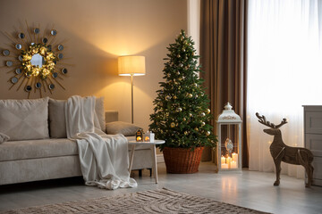 Beautiful Christmas tree and other decor in cozy room. Festive interior design