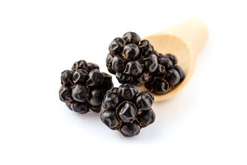 Obraz premium Black pepper grains on marble background 