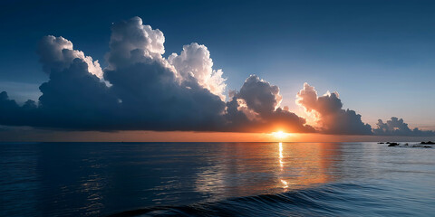 Golden Sunset Over the Ocean: The radiant sun dips towards the horizon, casting a warm golden glow across the tranquil sea, with fluffy clouds mirroring the vibrant hues.