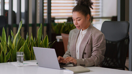 Serious ethnic woman African American girl businesswoman female employer broker agent lady business...