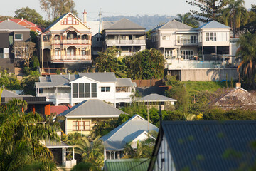 Traditional, old and modern houses on a steep sided slope in Red Hill, Brisbane
