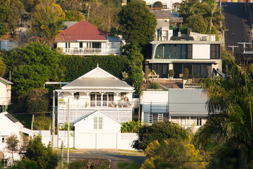 Traditional, old and modern houses on a steep sided slope in Red Hill, Brisbane