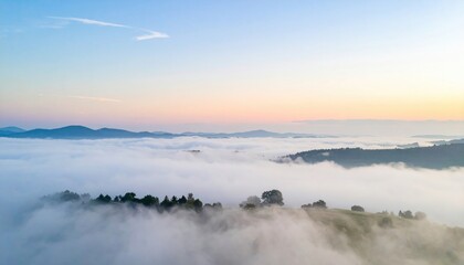 Obraz premium Serene morning fog rolling over mountain landscape nature photography aerial view tranquil environment
