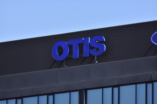 Otis Elevator Company logo, emblem, signage on the facade. WARSAW, POLAND - APRIL 13, 2025