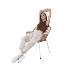 Fototapeta premium Beautiful woman relaxing in comfortable armchair on white background