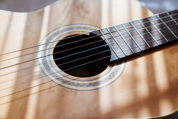 Obraz premium rays of light on the guitar.