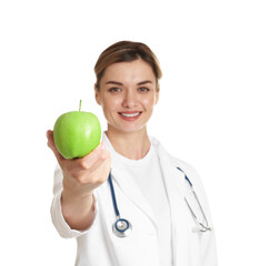 Nutritionist with green apple and stethoscope on white background, selective focus