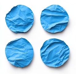 Fototapeta premium Four crumpled blue circles on a white background
