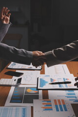 Business handshake for teamwork of business merger and acquisition,successful negotiate,hand shake,two businessman shake hand with partner to celebration partnership and business deal concept