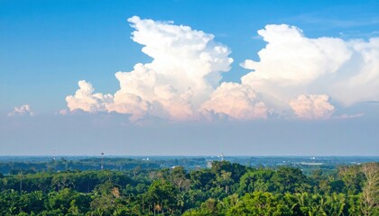 Fototapeta premium Majestic cloud formation over lush green landscape tropical region nature photography daytime wide angle serenity