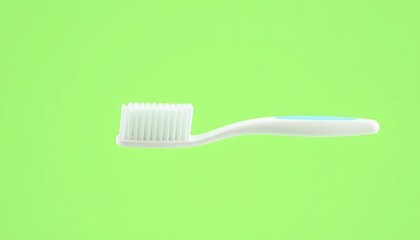 Close Up of a White and Blue Toothbrush Isolated on Green Screen Background Perfect for Dental Hygiene Product Promotion Mockup Ads