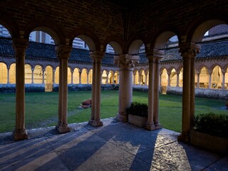 Courtyard with patio and columns in Basilica di San Zeno Maggiore in Verona at night