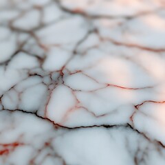 Close-up view of a marble surface, featuring intricate veins and cracks. Soft lighting highlights the natural textures