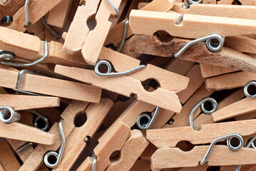 Wooden clothespins close-up. Clothespins background