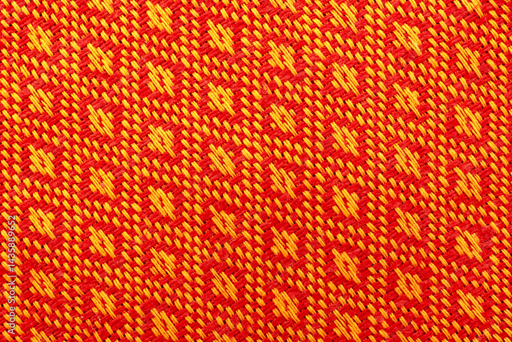 Poster texture of orange linen fabric with a pattern. pattern on textiles