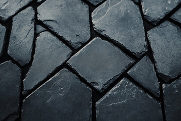Obraz premium Close-up of a textured slate tile surface.