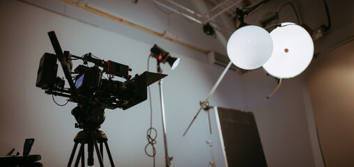 Film set, monitors and modern shooting equipment. Film crew, lighting devices, monitors, playbacks...