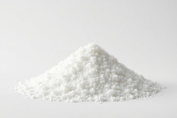 Lumps of refined white sugar against a plain white background, confectionery, macro
