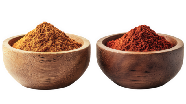 two wooden bowls filled with vibrant spices. one containing a golden-brown powder and the other a rich red powder this visually appealing arrangement highlights the diversity of spices used in culinar - Powered by Adobe