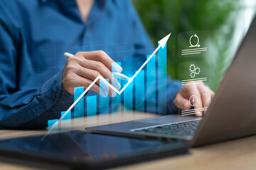 Business growth and financial development concept, Businesswoman drawing growth graph of financial data analysis, Marketing plan, Investing, Time management, Agile development, Company target, Stock