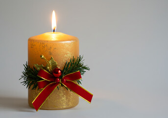Gold Glitter Christmas Candle with Red Bow and Holly